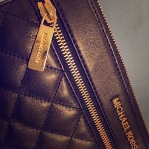 Michael Kors Classic Black wristlet.